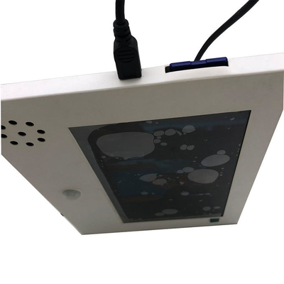 Motion sensor video player. Video LCD module activated by an motion sensor or button control